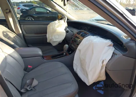 2003 Toyota Avalon Xl/Xls z USA, uszkodzony, nr VIN 4T1BF28B03U326821